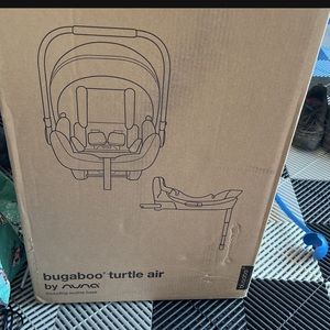 Baby car seat brand new in a box , never opened . Color black . Bugaboo brand